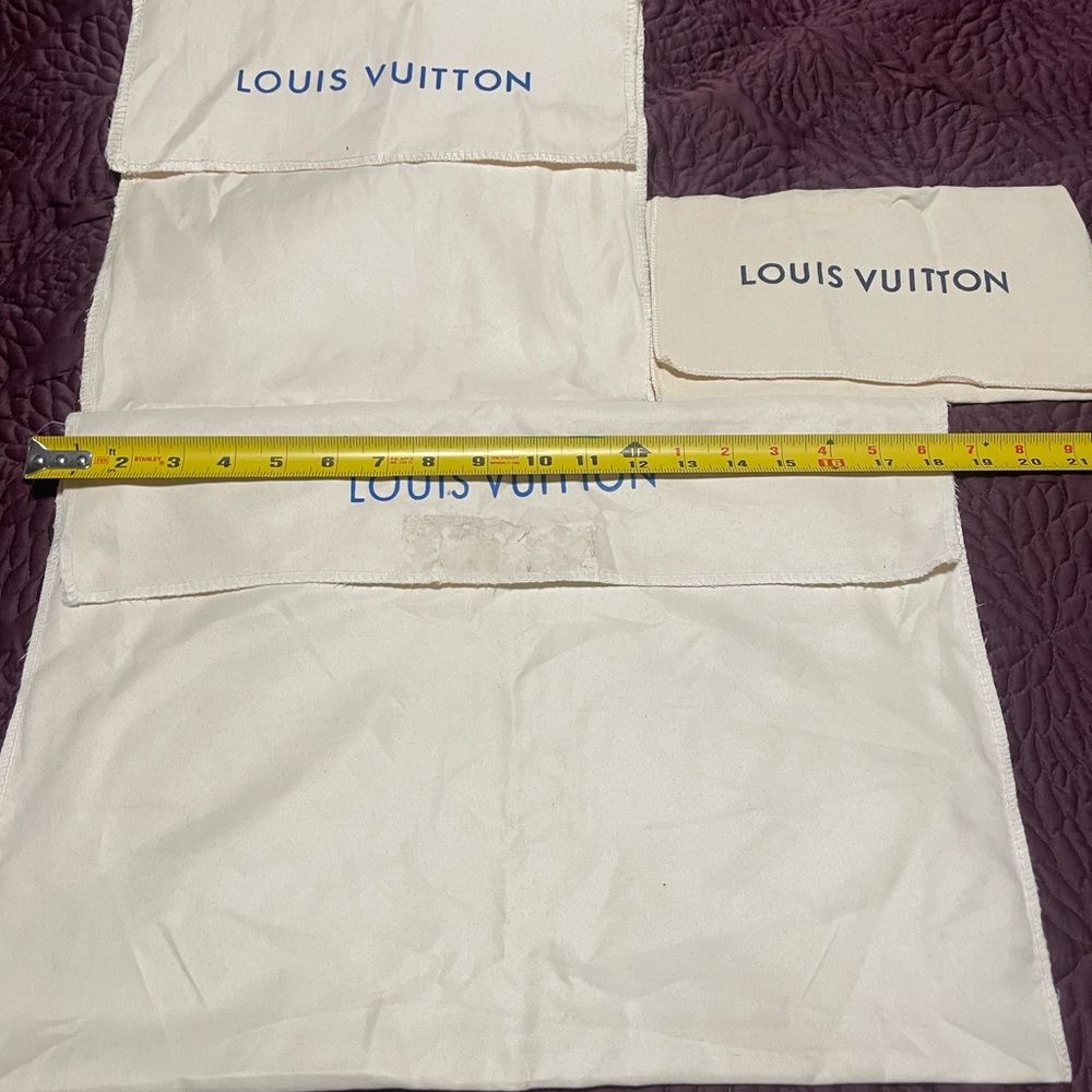 Louis Vuitton Cream Pouches